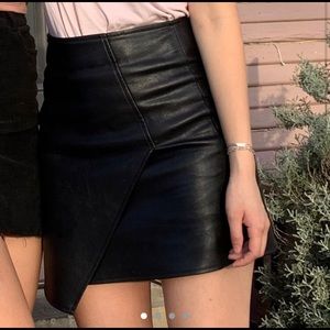 Tight black leather short mini skirt